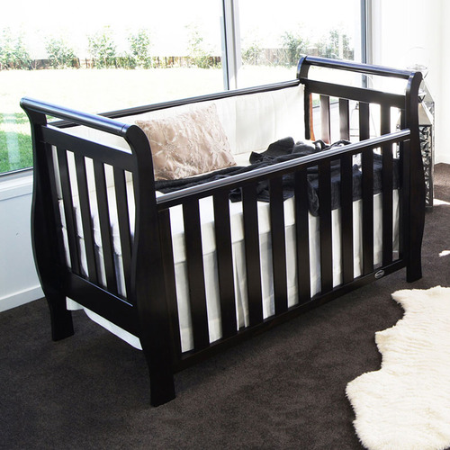 Dark wood sleigh outlet cot bed